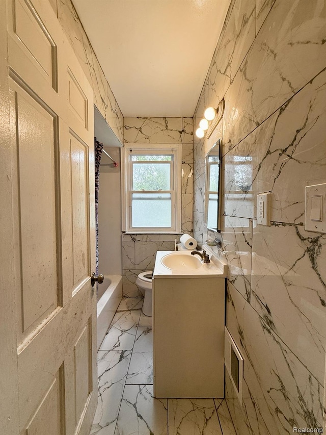 6507 Penrod St, Dearborn, MI 48228 - full bath with vanity, toilet, shower / bath combination, and marble finish flooring