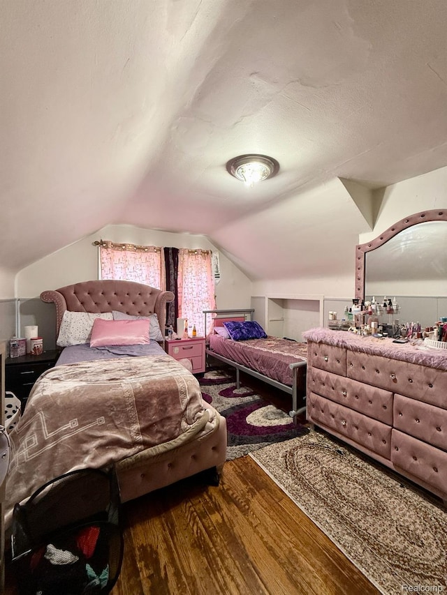6507 Penrod St, Dearborn, MI 48228 - bedroom with wood finished floors and lofted ceiling