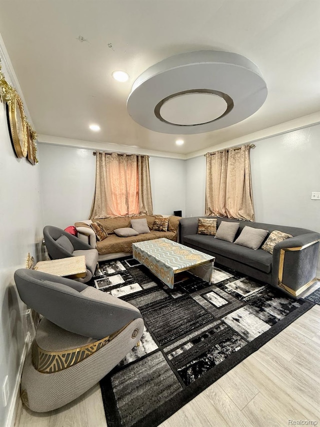 6507 Penrod St, Dearborn, MI 48228 - living area featuring wood finished floors, recessed lighting, a tray ceiling, and ornamental molding
