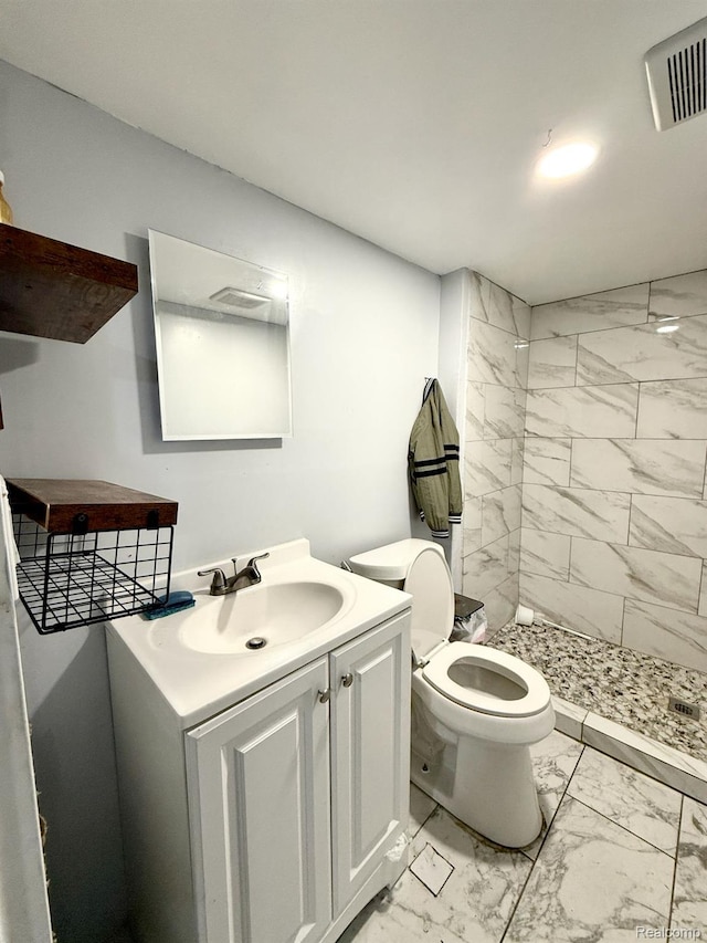 6507 Penrod St, Dearborn, MI 48228 - full bathroom featuring marble look tiles, toilet, vanity, and a shower stall