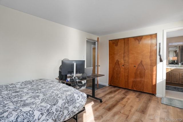 4173 Brandywyne Dr, Troy, MI 48098 - bedroom featuring wood finished floors and a closet