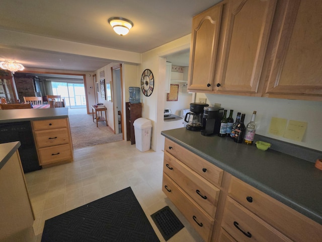 1352 Haughey Dr, Union City, MI 49094 - kitchen with dishwasher, light brown cabinetry, light carpet, and dark countertops