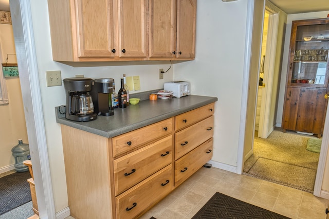 1352 Haughey Dr, Union City, MI 49094 - kitchen with dark countertops and baseboards