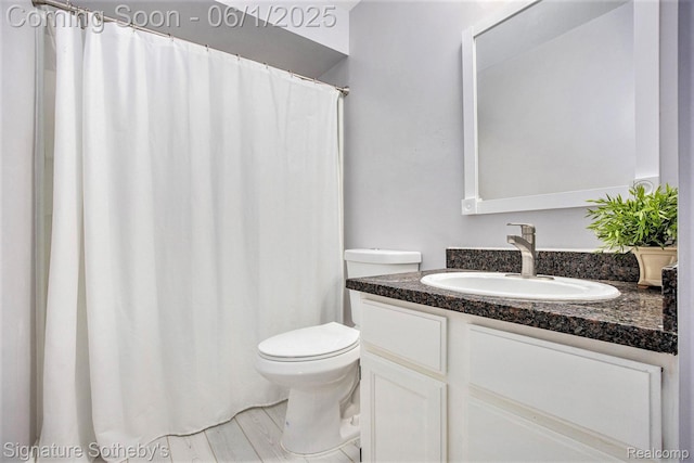 7674 Woodside Pl, Waterford, MI 48327 - bathroom with vanity, toilet, and a shower with curtain