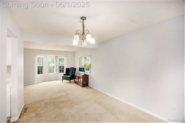 7674 Woodside Pl, Waterford, MI 48327 - living area with carpet, baseboards, and a chandelier