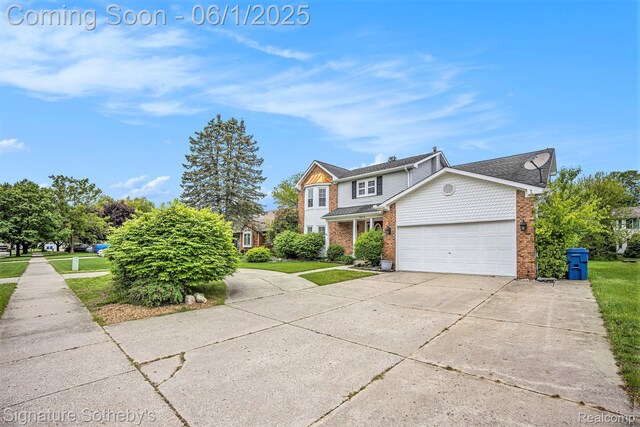 7674 Woodside Pl, Waterford, MI 48327 - traditional home featuring brick siding, an attached garage, concrete driveway, and a front lawn