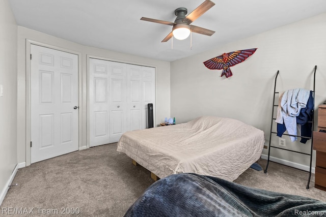 7485 Pointe Dr, Canton, MI 48187 - bedroom with carpet floors, baseboards, a closet, and a ceiling fan