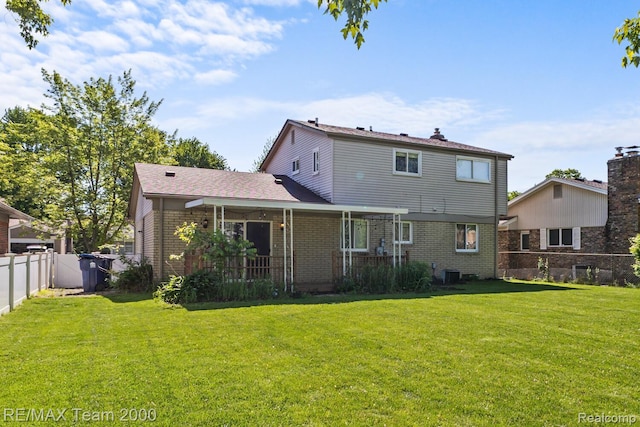 7485 Pointe Dr, Canton, MI 48187 - back of property featuring brick siding and central AC unit