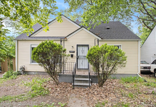 19455 Houghton St, Detroit, MI 48219 - view of front facade featuring roof with shingles