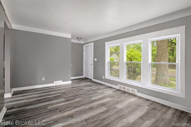 19455 Houghton St, Detroit, MI 48219 - spare room featuring wood finished floors and baseboards