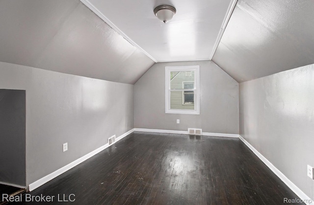 19455 Houghton St, Detroit, MI 48219 - bonus room featuring hardwood / wood-style floors, baseboards, and lofted ceiling