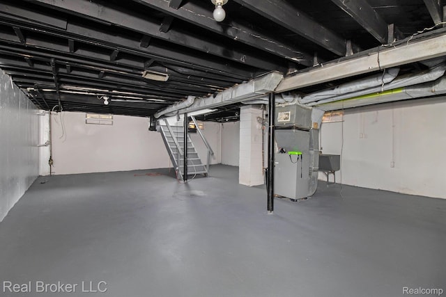 19455 Houghton St, Detroit, MI 48219 - unfinished basement featuring stairs and heating unit