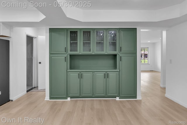 10419 Michael St, Dearborn, MI 48180 - bar featuring light wood finished floors, baseboards, and recessed lighting