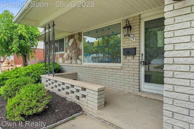 10419 Michael St, Dearborn, MI 48180 - entrance to property with a porch and brick siding