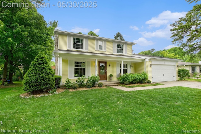 44947 Partridge Dr, Plymouth, MI 48170 - traditional-style home with driveway, a garage, covered porch, and a front yard