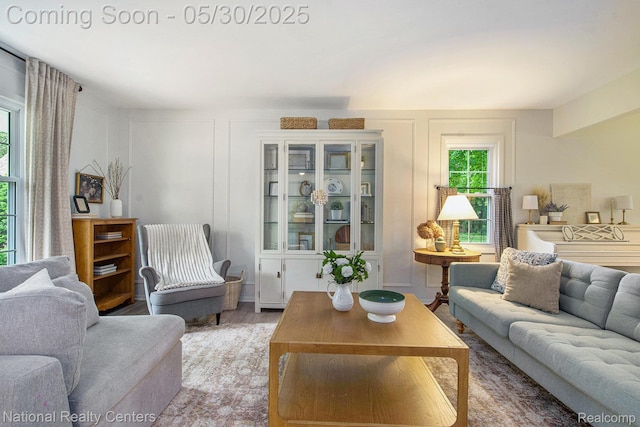 44947 Partridge Dr, Plymouth, MI 48170 - living area with light wood-type flooring and a decorative wall