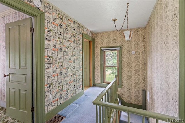 91 Dennison St, Oxford, MI 48371 - hall featuring wallpapered walls, carpet, and an upstairs landing