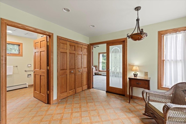 91 Dennison St, Oxford, MI 48371 - entrance foyer with baseboard heating, light floors, french doors, baseboards, and recessed lighting