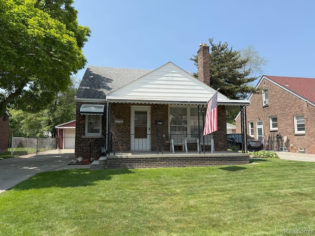 4017 Woodworth St, Dearborn, MI 48126 - bungalow featuring a chimney, a porch, and brick siding
