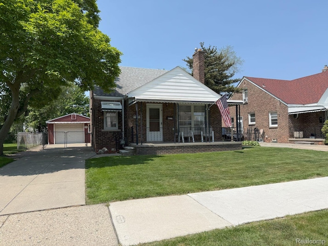 4017 Woodworth St, Dearborn, MI 48126 - bungalow-style house with covered porch, a garage, an outbuilding, brick siding, and a front yard