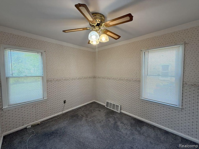 4017 Woodworth St, Dearborn, MI 48126 - empty room featuring dark colored carpet, ceiling fan, and crown molding