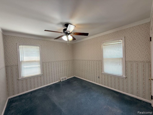 4017 Woodworth St, Dearborn, MI 48126 - unfurnished room with healthy amount of natural light, wallpapered walls, and ceiling fan