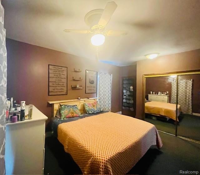 203 S Main St, Capac, MI 48014 - bedroom with carpet, a ceiling fan, and a closet