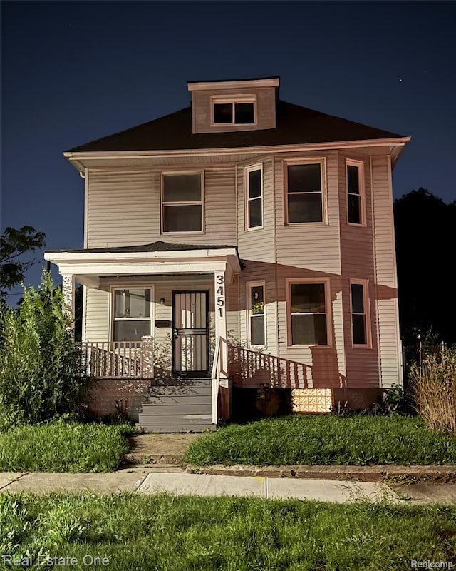 3451 Baldwin St, Detroit, MI 48214 - traditional style home featuring a porch