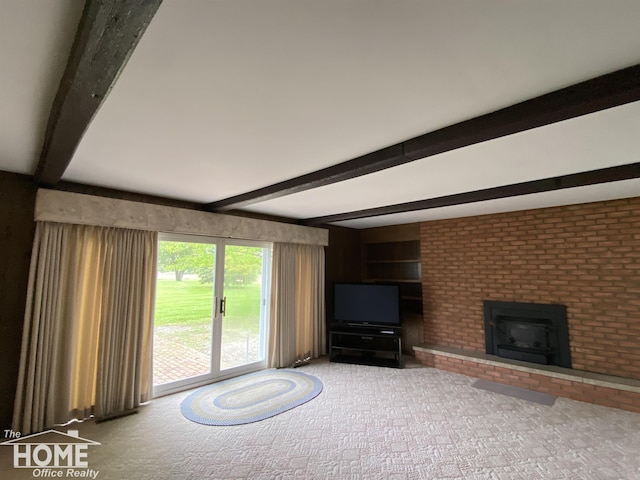 2437 S State Rd, Corunna, MI 48817 - unfurnished living room featuring beamed ceiling, a fireplace, and carpet