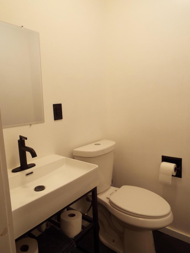 407 Doty St, Leslie, MI 49251 - half bathroom with toilet and a sink