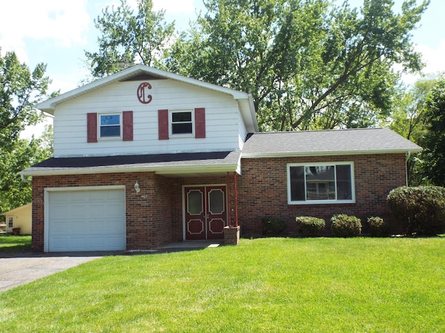 407 Doty St, Leslie, MI 49251 - view of front of property with a garage, brick siding, a front yard, driveway, and a shingled roof