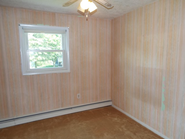 407 Doty St, Leslie, MI 49251 - unfurnished room featuring carpet floors, baseboard heating, ceiling fan, and baseboards