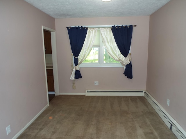 407 Doty St, Leslie, MI 49251 - unfurnished room featuring baseboard heating, a baseboard heating unit, carpet, baseboards, and a textured ceiling