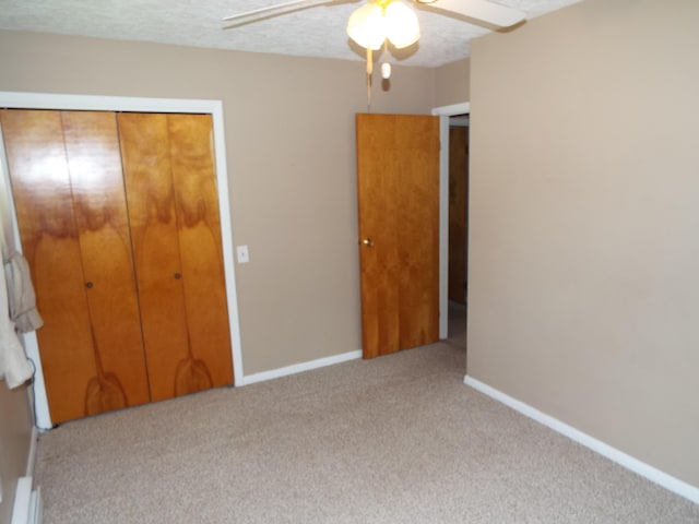 407 Doty St, Leslie, MI 49251 - unfurnished bedroom with carpet flooring, baseboards, a closet, and ceiling fan