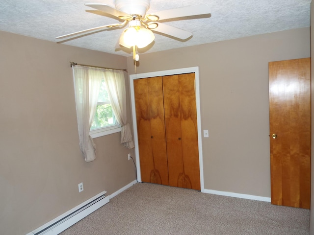 407 Doty St, Leslie, MI 49251 - unfurnished bedroom with a baseboard radiator, light carpet, a textured ceiling, a closet, and baseboards