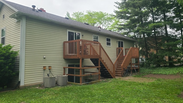 1828-1830 Winton, Kalamazoo, MI 49001 - back of house featuring stairs, a lawn, a deck, and cooling unit