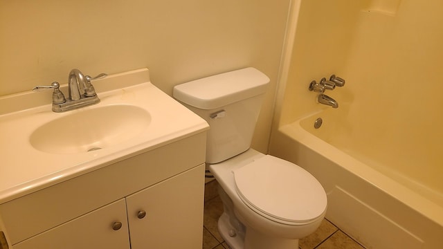 1828-1830 Winton, Kalamazoo, MI 49001 - bathroom featuring toilet, tile patterned flooring, vanity, and shower / tub combination