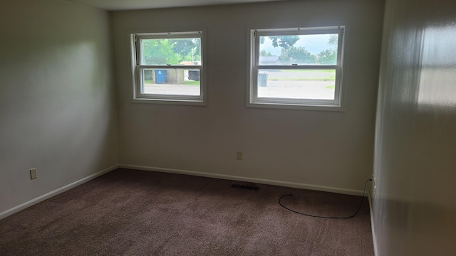 1828-1830 Winton, Kalamazoo, MI 49001 - spare room featuring dark colored carpet and baseboards