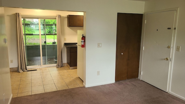 1828-1830 Winton, Kalamazoo, MI 49001 - kitchen featuring light colored carpet, baseboards, and light tile patterned floors