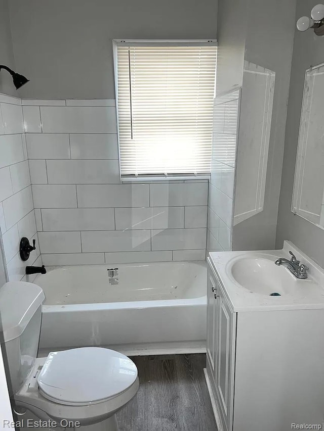 2332 Clements St, Detroit, MI 48238 - full bathroom with toilet, vanity, and shower / washtub combination