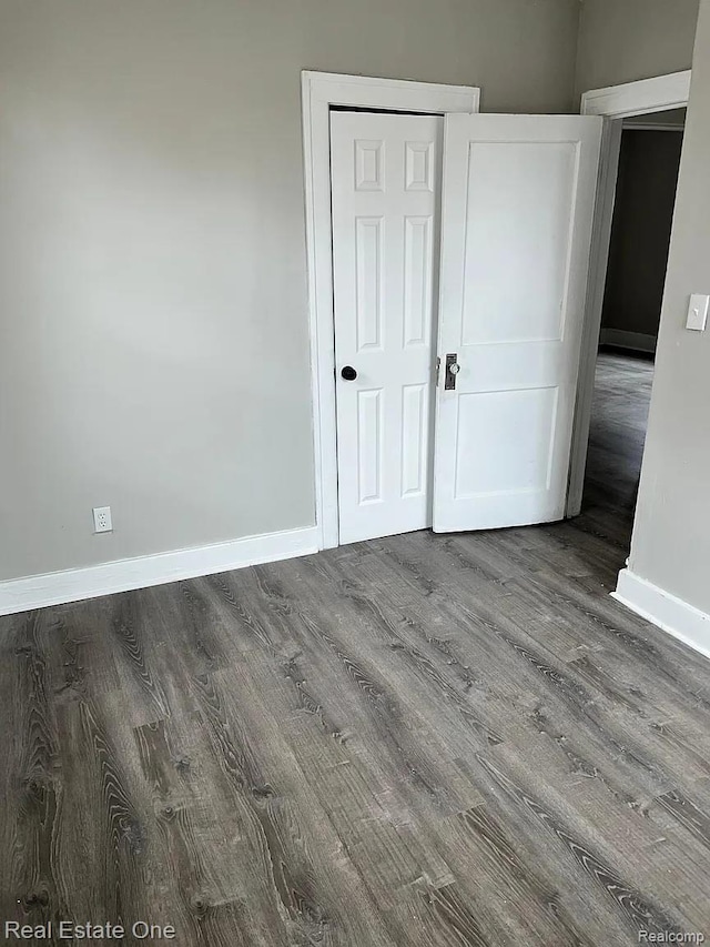2332 Clements St, Detroit, MI 48238 - unfurnished bedroom featuring baseboards and wood finished floors