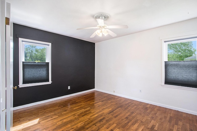 1804 Lakeway Ave, Kalamazoo, MI 49001 - spare room featuring plenty of natural light, wood finished floors, baseboards, and ceiling fan