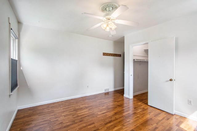 1804 Lakeway Ave, Kalamazoo, MI 49001 - unfurnished bedroom featuring wood finished floors, ceiling fan, baseboards, and a closet