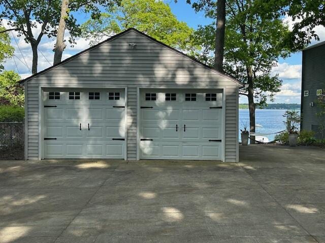9393 Fraulin Dr, Richland, MI 49083 - detached garage with a water view
