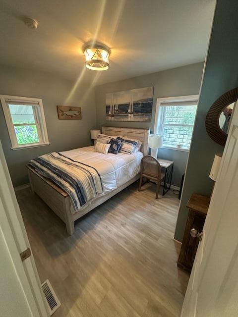 9393 Fraulin Dr, Richland, MI 49083 - bedroom with light wood-style floors and baseboards