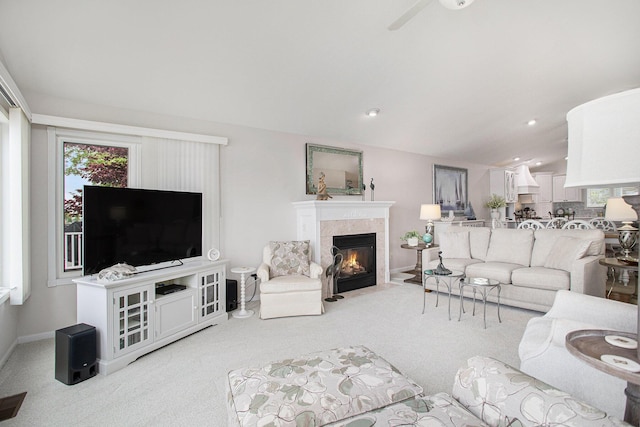 714 N Hawley Dr, Coldwater, MI 49036 - living room featuring carpet floors, a tiled fireplace, recessed lighting, baseboards, and ceiling fan