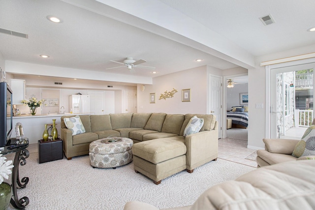 714 N Hawley Dr, Coldwater, MI 49036 - living room with ceiling fan, recessed lighting, and light carpet