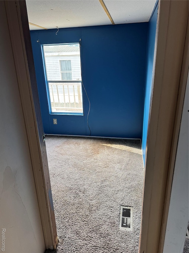 2445 E Grand River Rd, Lot, Williamston, MI 48895 - empty room featuring carpet flooring