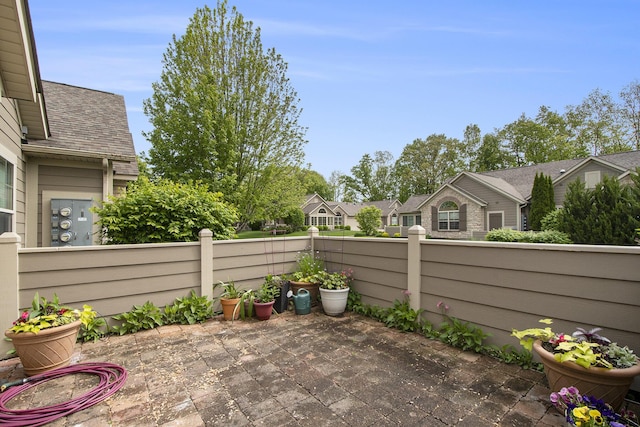 933 Bridge Crest Dr SE, Ada, MI 49301 - view of patio with a residential view