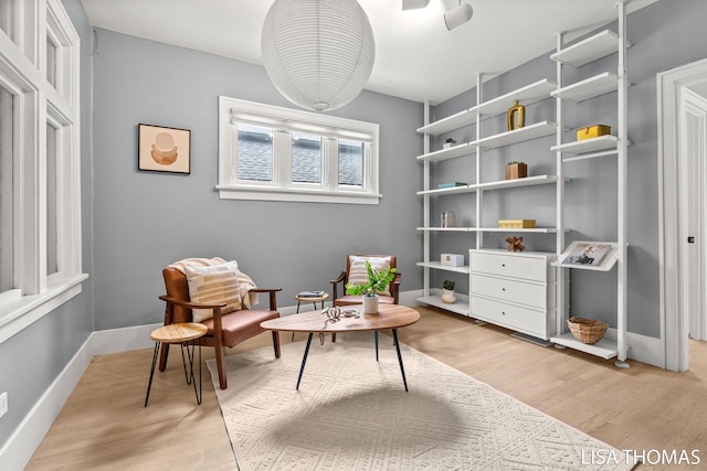 1000 Garfield Ave NW, Grand Rapids, MI 49504 - living area featuring light wood-style floors and baseboards